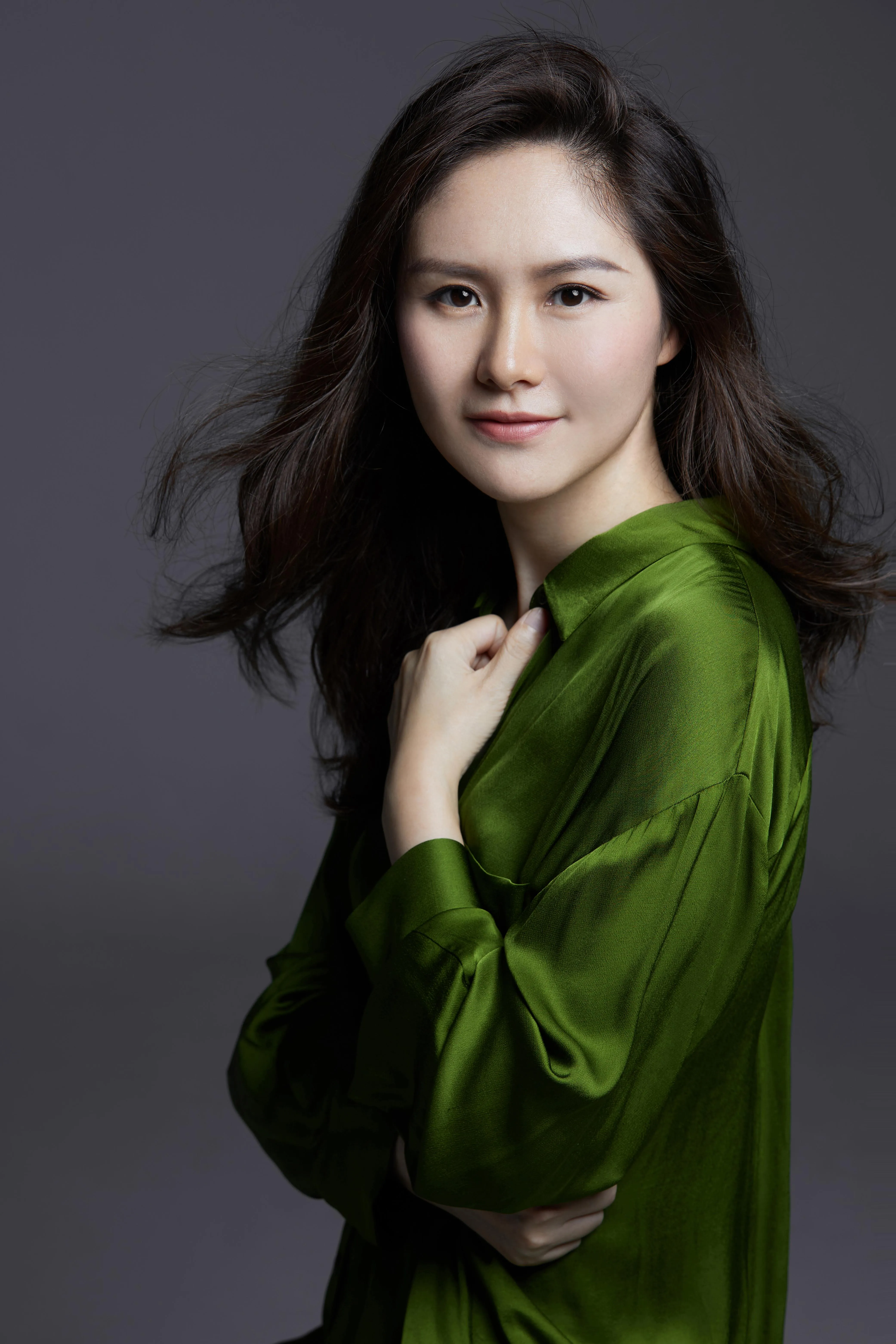 Sherry Xiaoxiao Qi